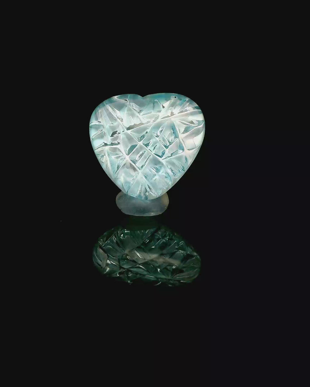 Topas Heart on Mother of Pearl